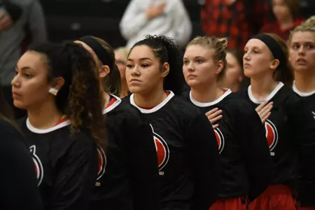 Huskies lined up for the National Anthem during pregame