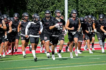 Huskies hustling to their next practice drill.