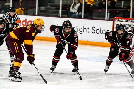 Alice Sauriol and Taylor Larson Take Part in a Face-off Against the Gophers