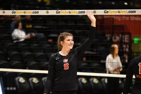Senior outside hitter Kenzie Foley waves to the crowd during St. Cloud State's win over No. 14 Alaska Anchorage on Sep. 1, 2023 at the Alaska Airlines Center.