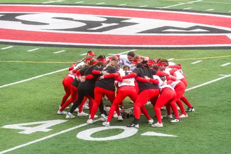 Team huddle vs. MSU Moorhead 4-18-25