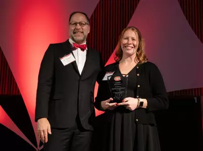 President Tomso (L) and Abby Rittenhouse (R) 10-2-26 #OurSCSU Gala Graduate of the Last Decade (GOLD) Award