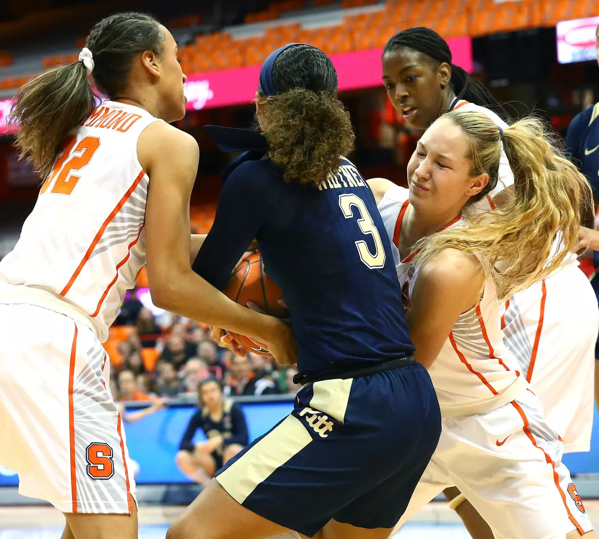 Miranda Drummond & Digna Strautmane force a jump ball.