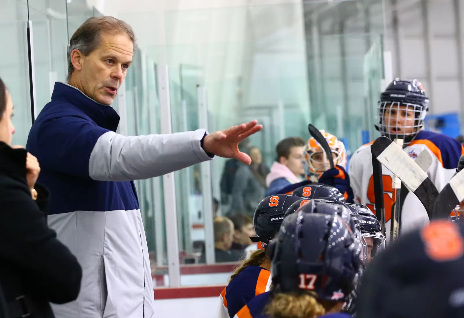 Head coach Paul Flanagan talks with his team.