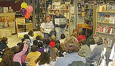 SU Softball Participates in Community Reading Program Image