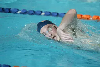 Despite Nine First-Place Finishes, Swimming and Diving Falls to UConn Image