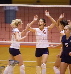 Volleyball Continues To Roll; Defeats St. John’s In Five Games Image