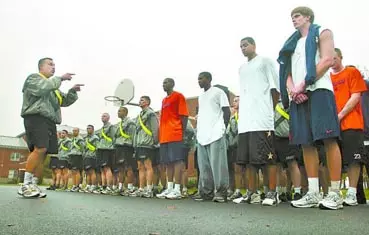 Men's Basketball Visits Fort Drum Image