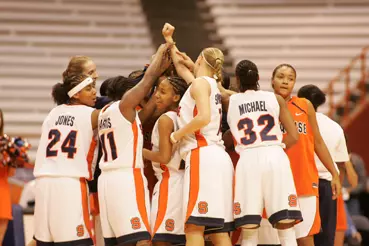 Orange Shines In the Class Room And On The Court Image