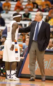 Head coach Jim Boeheim talks with guard Jonny Flynn