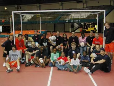 Syracuse Men's Soccer Team Teaches Kids About Life and the Sport Image