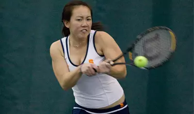 Christina Tan delivers the two-hand smash.