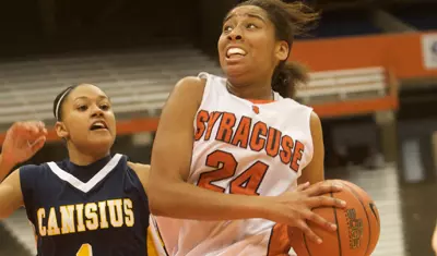 Chandrea Jones drives on Canisius.