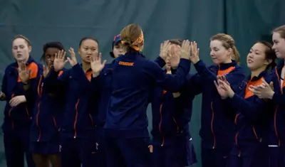 Syracuse tennis celebrating