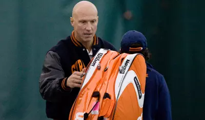 Head coach luke Jensen instructing Chelsea Jones.