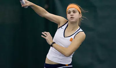 Ashley Spicer delivers the forehand smash.