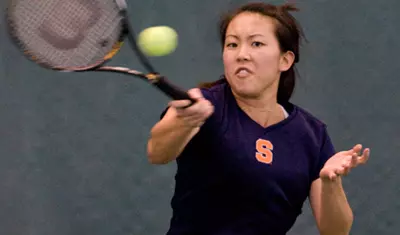 Christina Tan delivers the forehand.