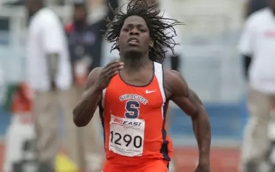 Shamel Lewis sprints the 100-meter dash.