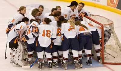 The Ice Hockey Team Huddles.