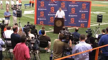 Doug Marrone talks with the media at SU's 2009 Media Day.