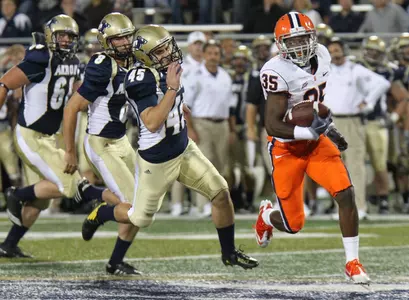 Mike Holmes returns a punt at Akron