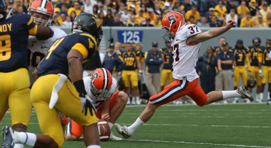 Ross Krautman kicks a field goal at WVU