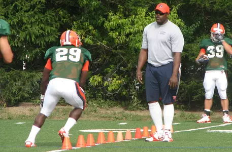 Antwon Bailey and coach Tyrone Wheatley