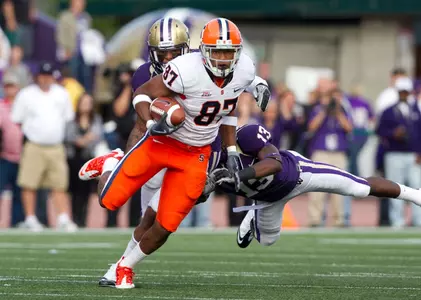 Aaron Weaver runs after the catch at Washington.