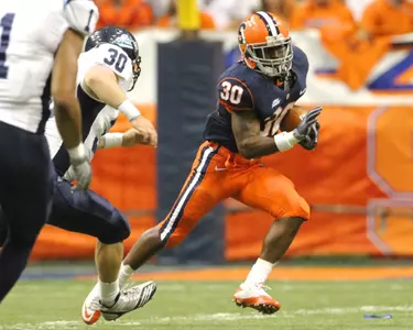 Steve Rene returns a punt against Maine
