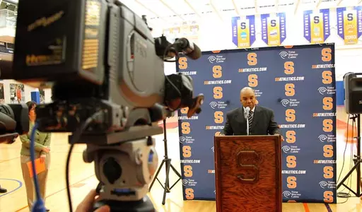 Coach Hillsman addresses the media.