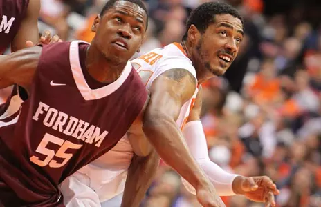 Fab Melo fights for the rebound.