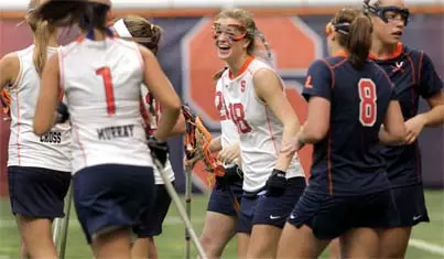 Katie Webster celebrates a goal against Virginia.