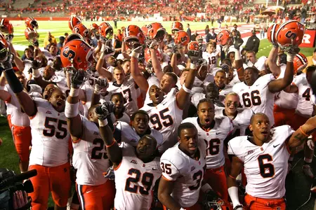 2010 football team celebrates victory at Rutgers