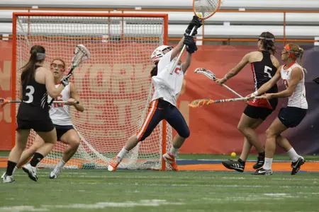 Liz Hogan makes a save against Cincinnati.