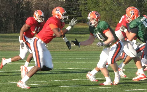 Defensive end Chandler Jones and tight end Nick Provo battle in practice