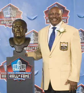 Floyd Little with Hall of Fame bust