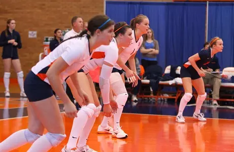 The Orange await a serve.