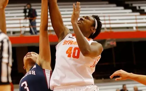 Kayla Alexander drives in for a layup.