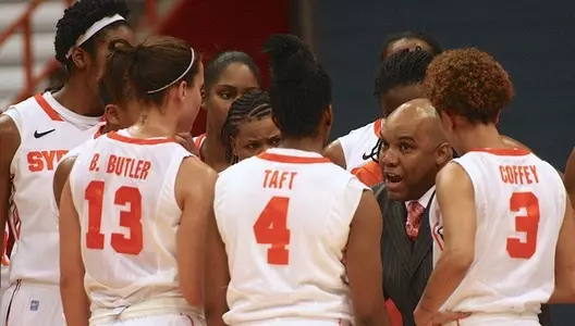 Coach Hillsman talks to his players.