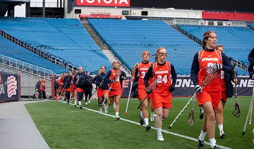 Orange takes the field at Gillette Stadium.