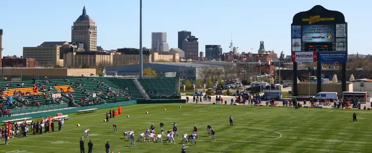 Orange football practices in Rochester