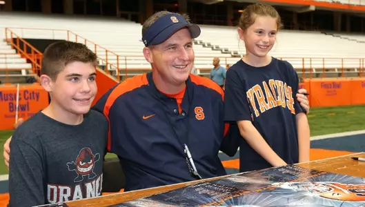 The SU football team signed autographs after practice during Orange Fanfest