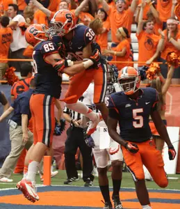 Chris Clark and Beckett Wales celebrate a touchdown
