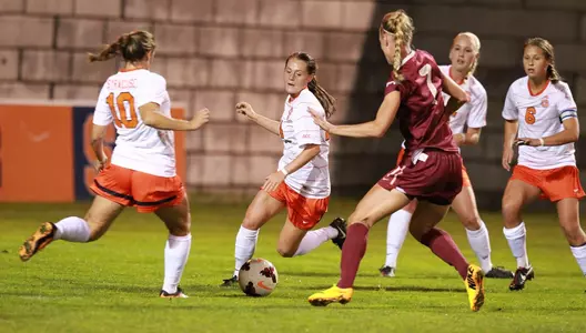 The SU defense swarms to the ball against No. 3 Florida State.