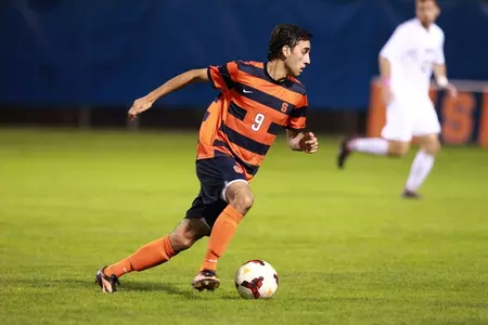 Stefanos Stamoulacatos dribbles.