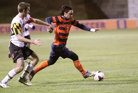 Alex Halis dribbles.