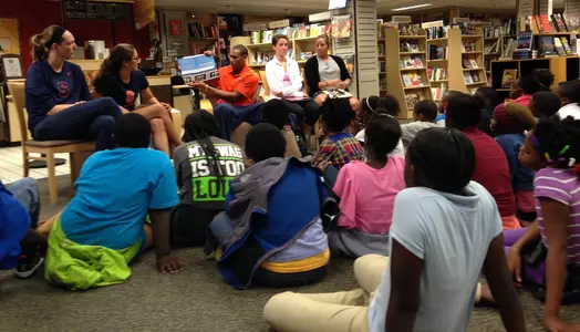Student-Athletes read to local students.