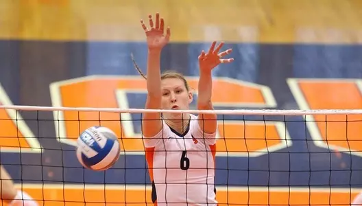 Monika Salkute on this block for a point.