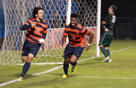 Alex Halis (7) reacts to his double-overtime goal. With him is Tyler Hillard (19).