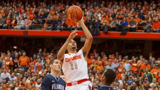 Tyler Ennis goes to the hoop.